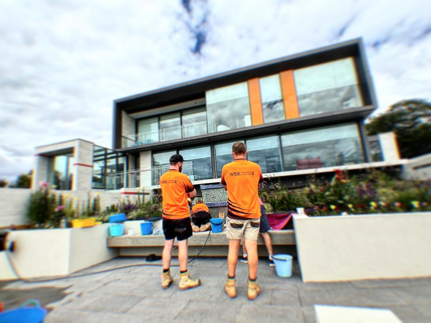 Wise Window Cleaning team cleaning a modern Hobart home